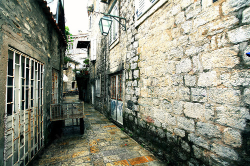 paved street stone walls Europe