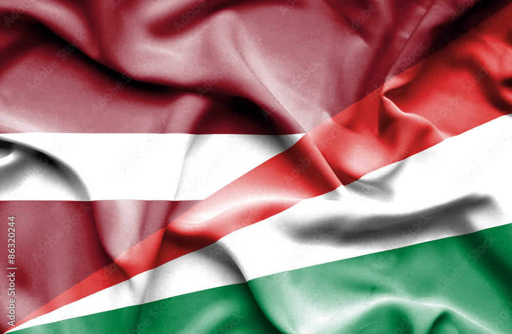 Waving flag of Seychelles and Latvia Waving flag of Seychelles and Latvia