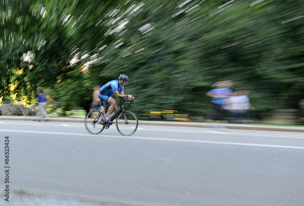 Blurred motion of Cyclists riding on bicycles at speed