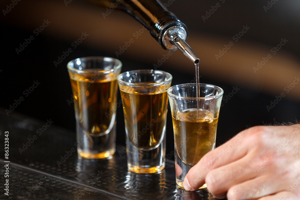 Shot glasses on a counter Shot glasses on a counter