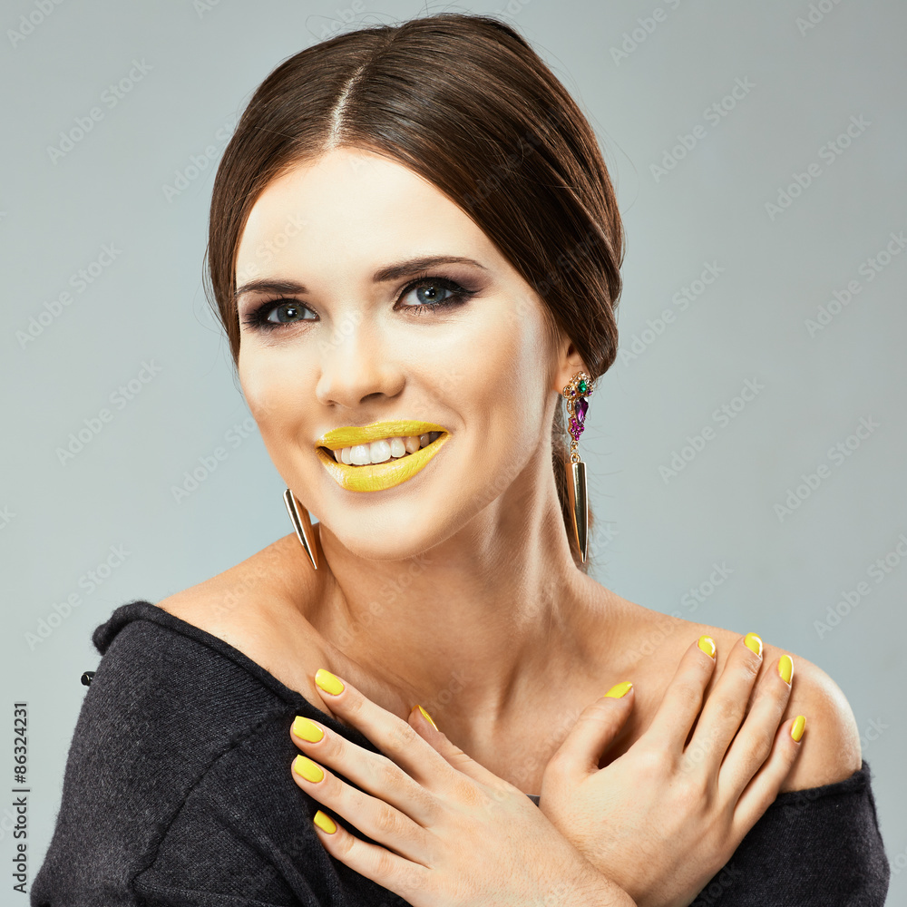 Beauty woman face portrait with yellow lips Beauty woman face portrait with yellow lips