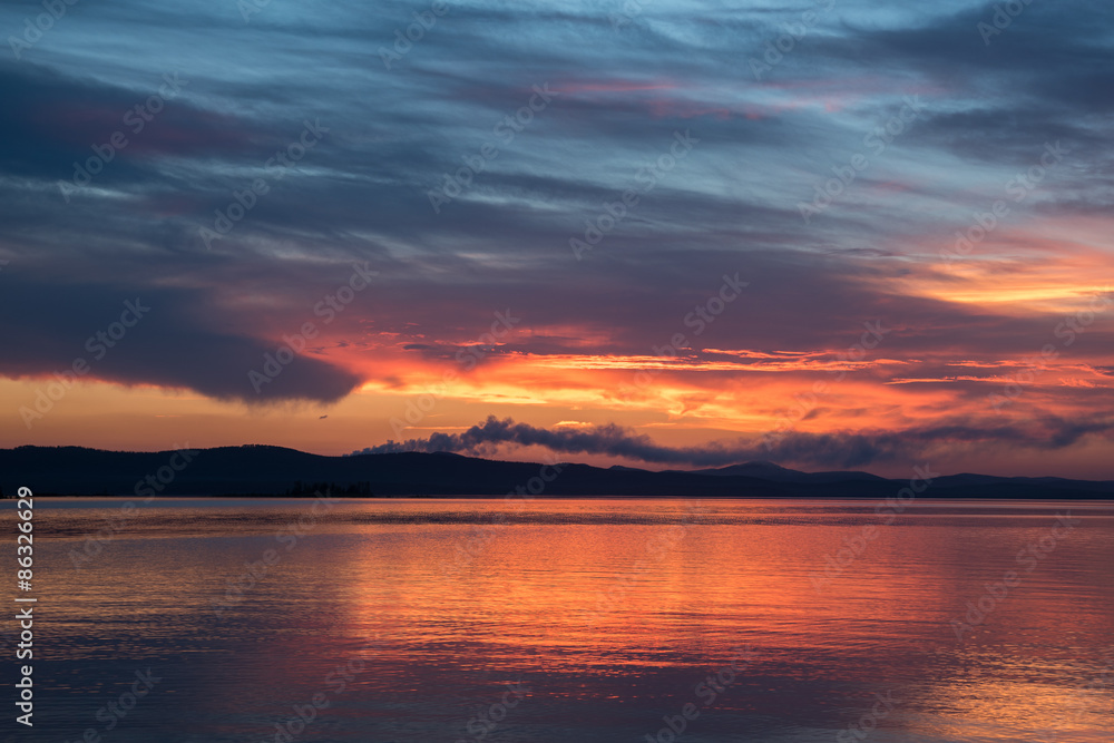 sunset at coast of the lake