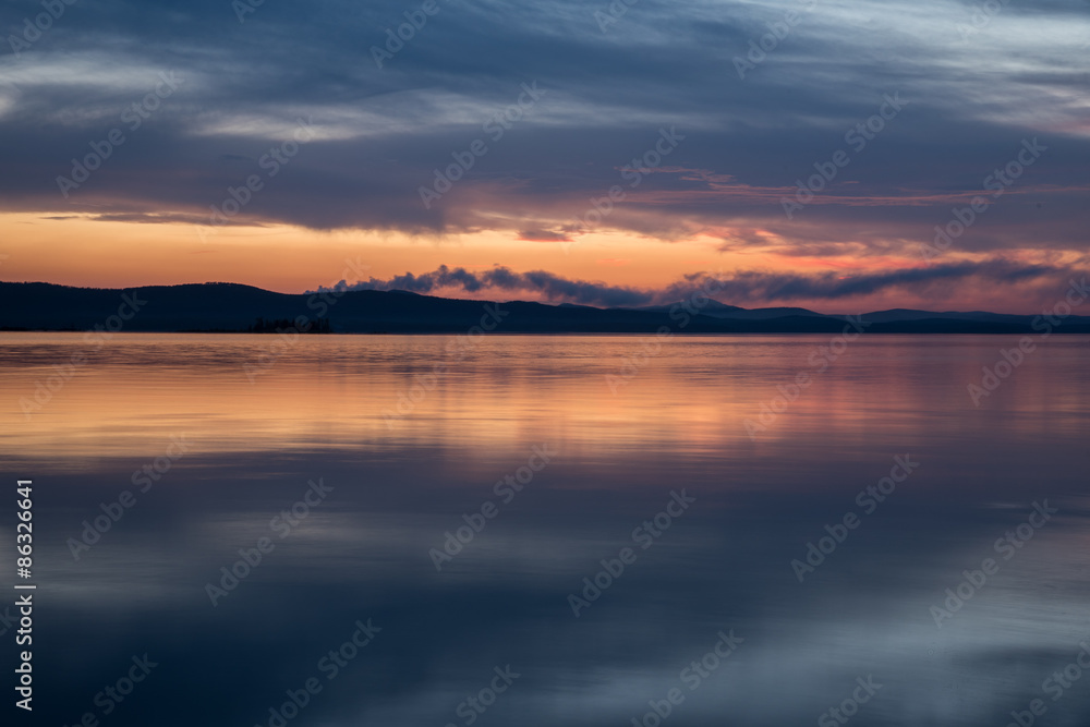 sunset at coast of the lake