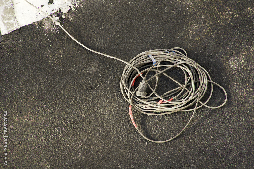 electric extension cord plug at construction site electric extension cord plug at construction site