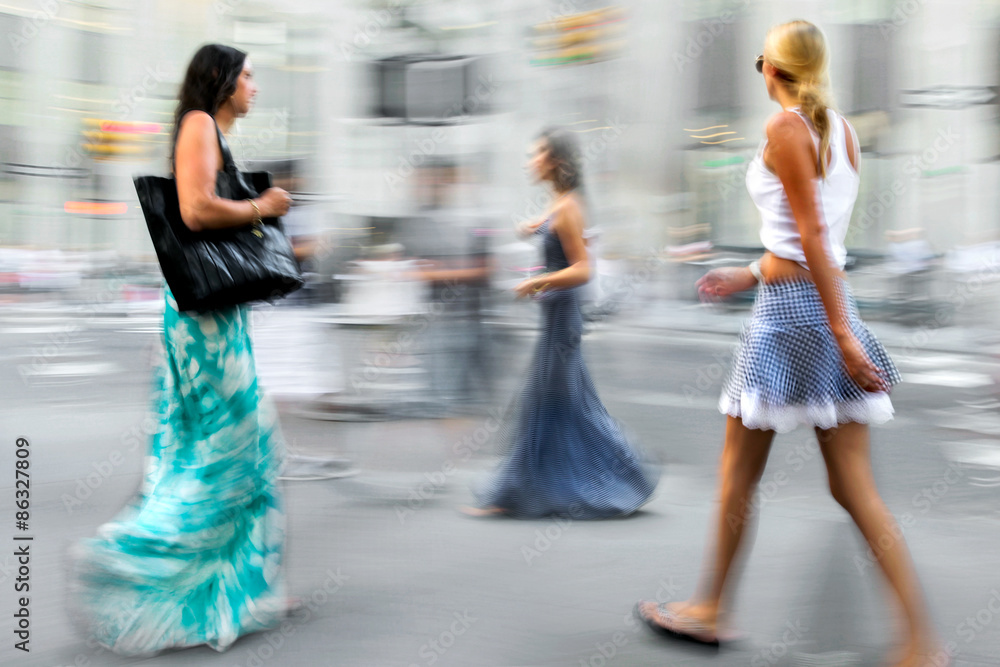 Fototapeta premium motion blurred business people walking on the street