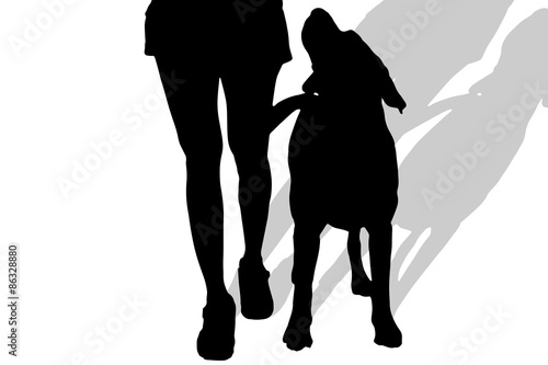Vector silhouette of a woman with a dog.