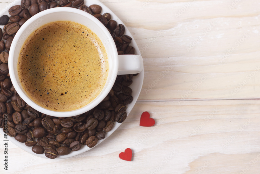 white cup of coffee with red hearts decoration white cup of coffee with red hearts decoration