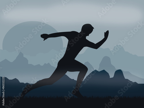 Running man on mountains during fog on night