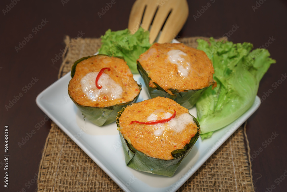 Fish curry in banana leaves, called Hor Mok in Thai Fish curry in banana leaves, called Hor Mok in Thai
