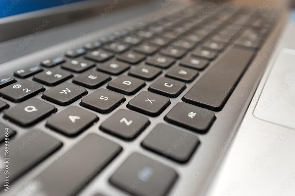 Silver Laptop computer keyboard close-up