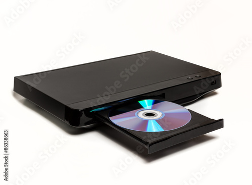 DVD CD MP3 JPEG player isolated on white background with open tray and disk in it