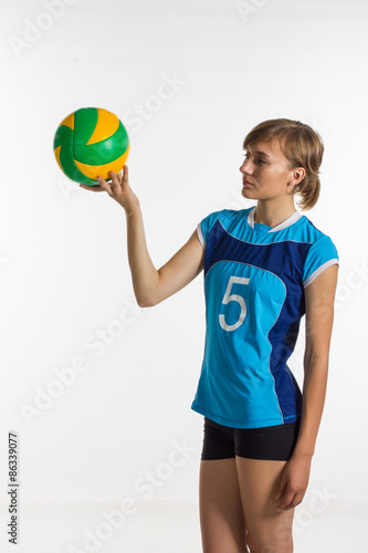 Young  sport woman with volleyball ball isolated