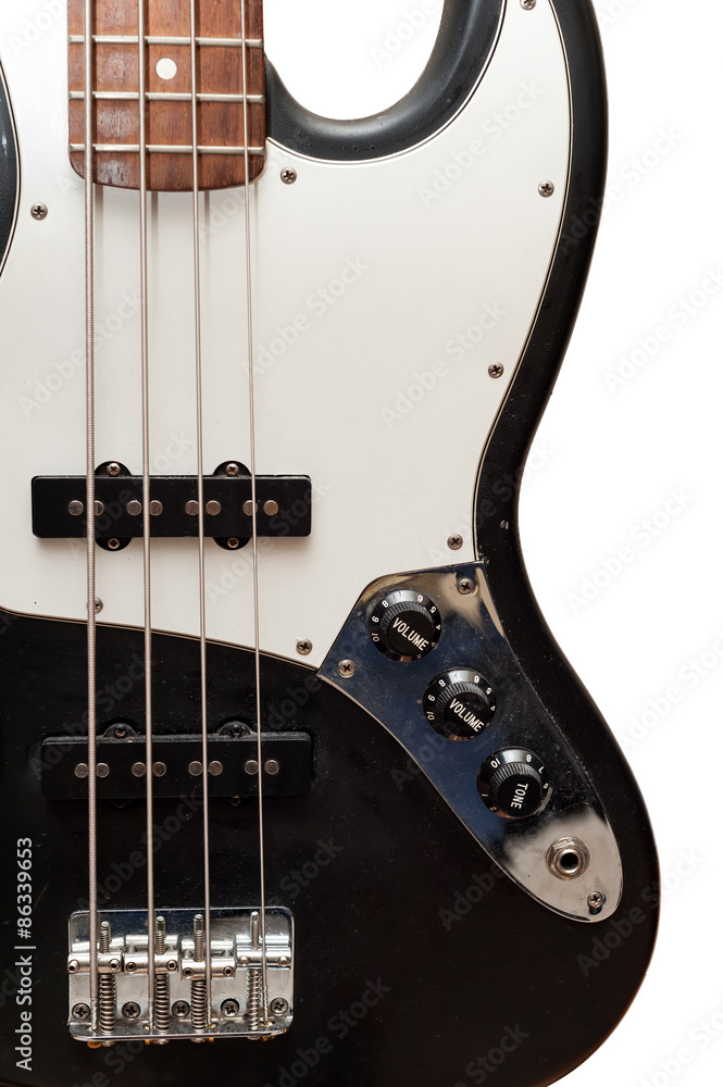 Vintage four string bass guitar body close up isolated on white