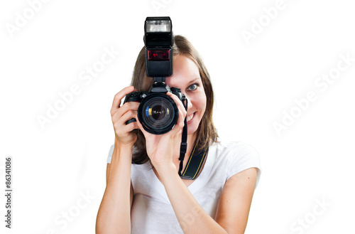 Teenage girl with her digital camera isolated on white background