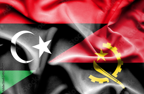 Waving flag of Angola and Libya