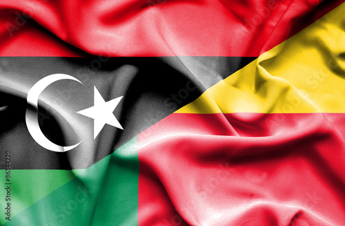 Waving flag of Benin and Libya