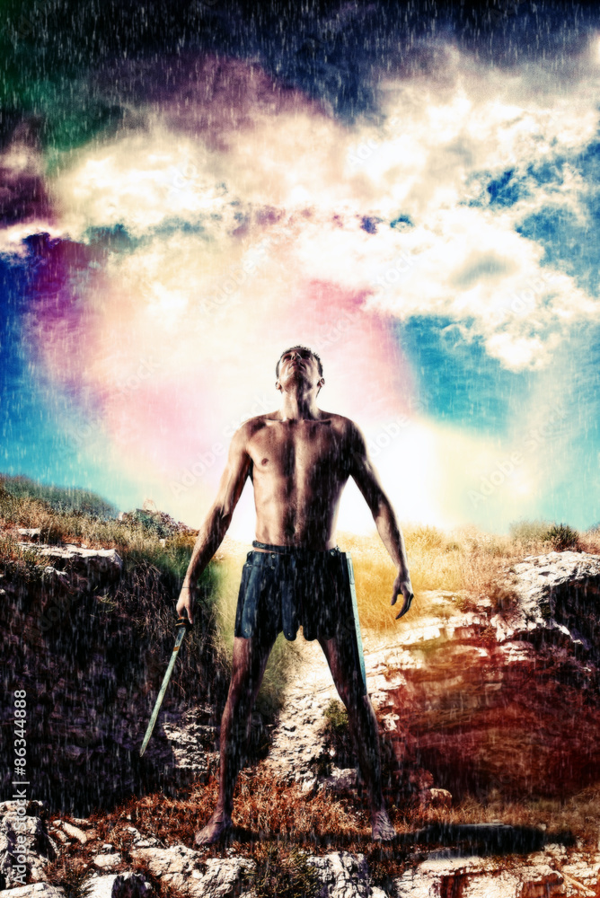 Obraz premium Warrior with sword staying in the rain and gathering storm is looking in the sky