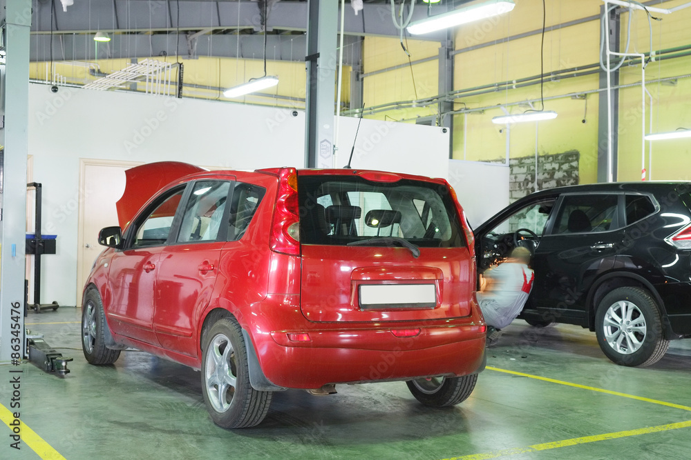 Serpuhov, Russia, June, 23, 2015: Cars in a dealer repair station in Serpuhov, Russia Serpuhov, Russia, June, 23, 2015: Cars in a dealer repair station in Serpuhov, Russia