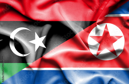 Waving flag of North Korea and Libya