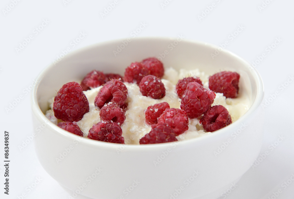 cup with cream cheese and raspberries cup with cream cheese and raspberries