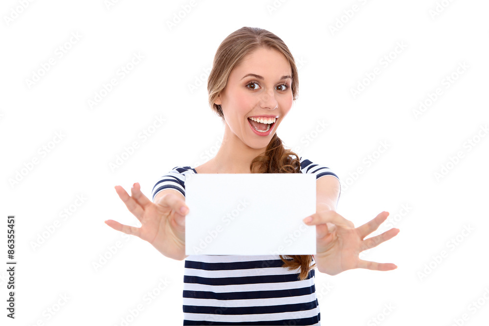 Student girl showing white blank sheet - copy space, isolated over background Student girl showing white blank sheet - copy space, isolated over background