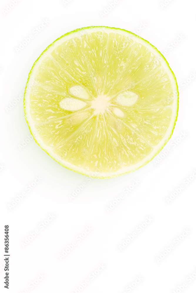 Top view of lime slice on white Top view of lime slice on white