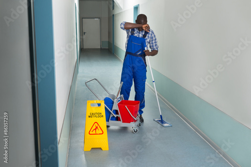 Tired Male Janitor