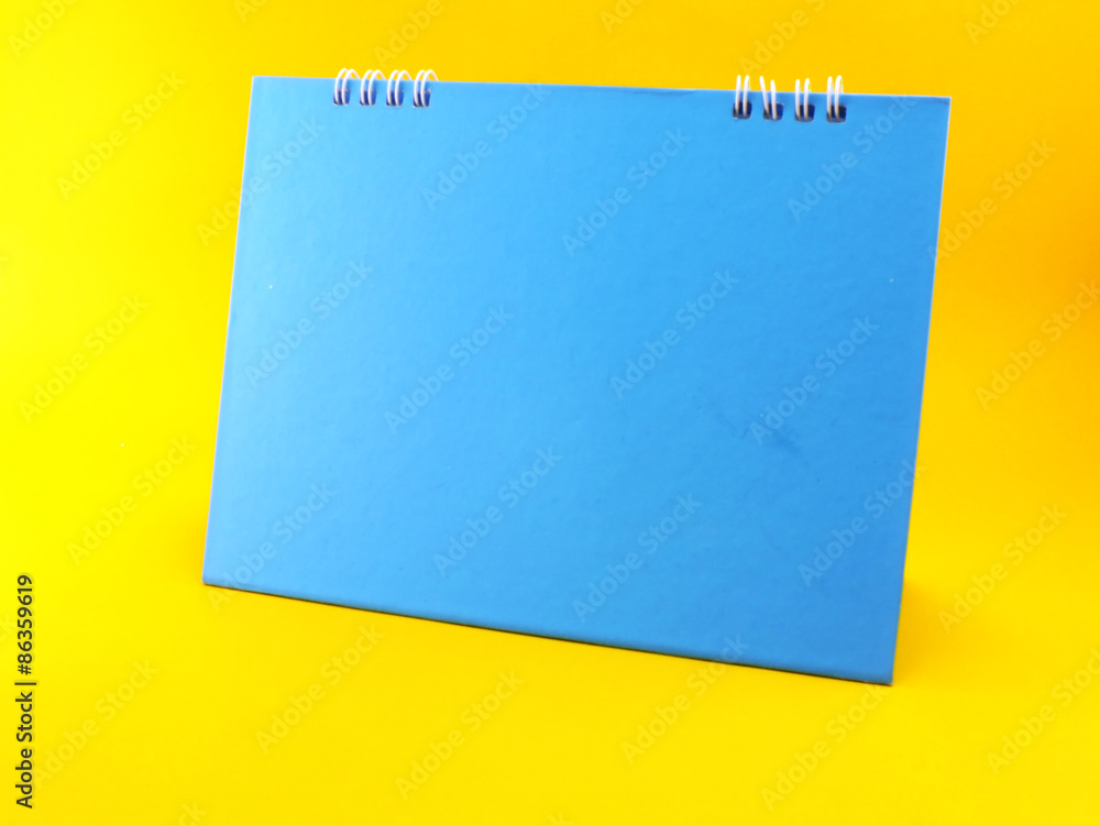 blue calendar blank on yellow background blue calendar blank on yellow background