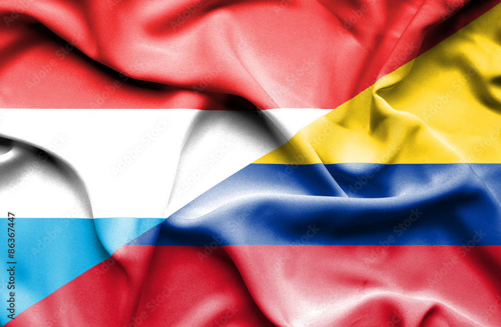 Waving flag of Columbia and Luxembourg Waving flag of Columbia and Luxembourg