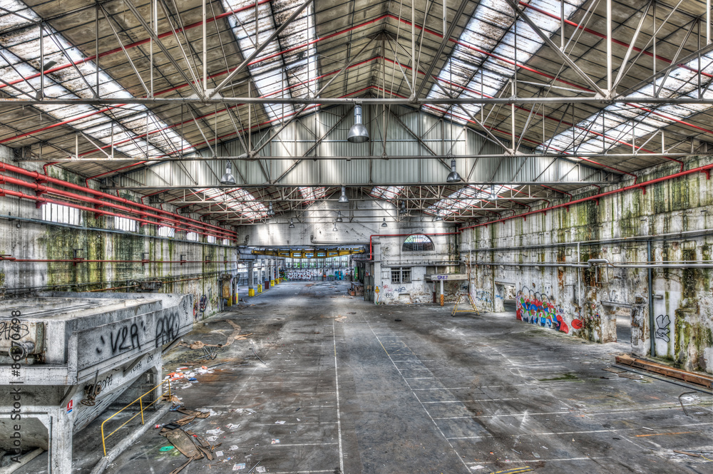 Decaying industrial hall in an abandoned factory Decaying industrial hall in an abandoned factory