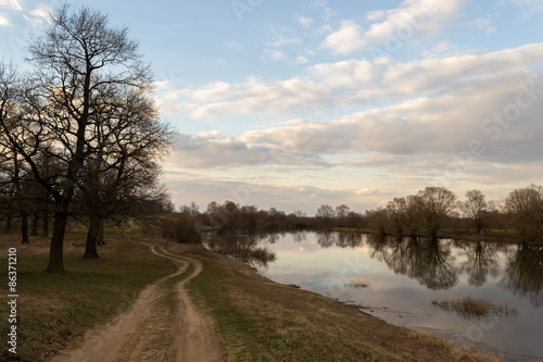 the road along the lake. a warm spring evening © Mr.Vander