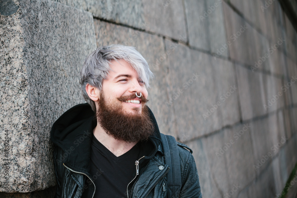 Bearded hipster with nose ring in leather jacket Bearded hipster with nose ring in leather jacket