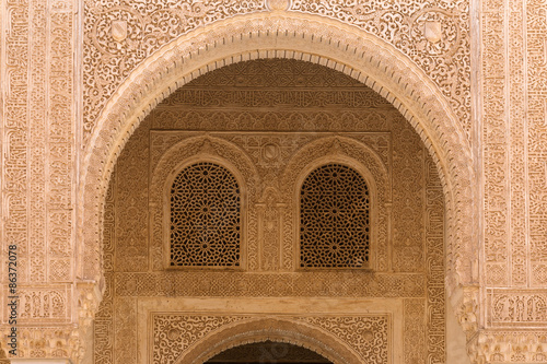 Moorish arch in famous Alhambra Nazaries palace, Granada, Spain