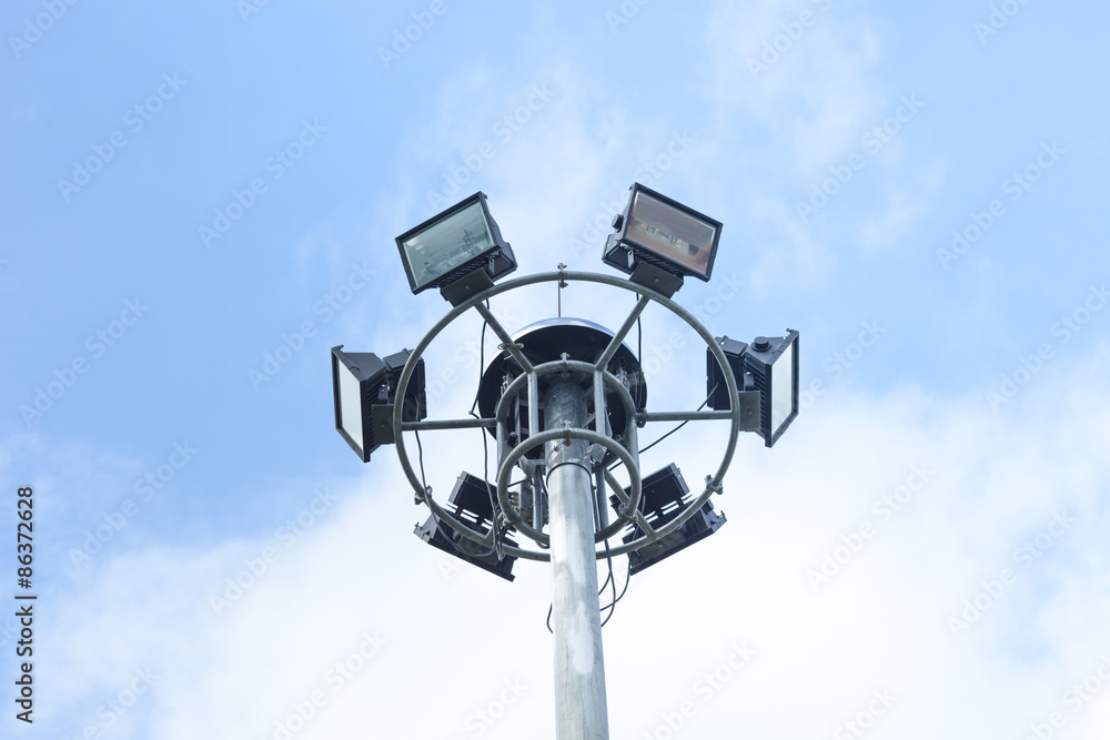 Stadium lights, isolated isolated on bule sky Stadium lights, isolated isolated on bule sky