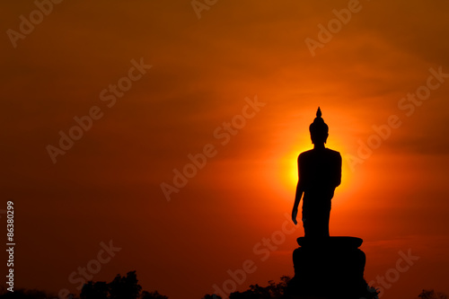 Photography Big buddha statue on sunset.