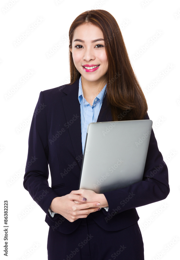 Young businesswoman holding with laptop computer