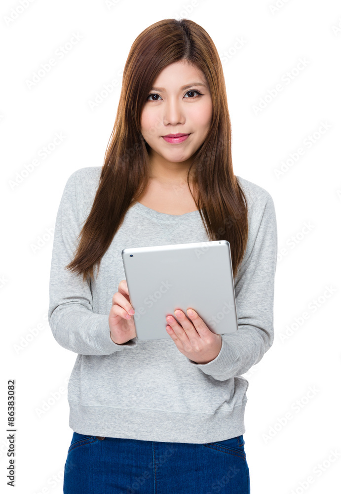 Asian woman use of the digital tablet Asian woman use of the digital tablet