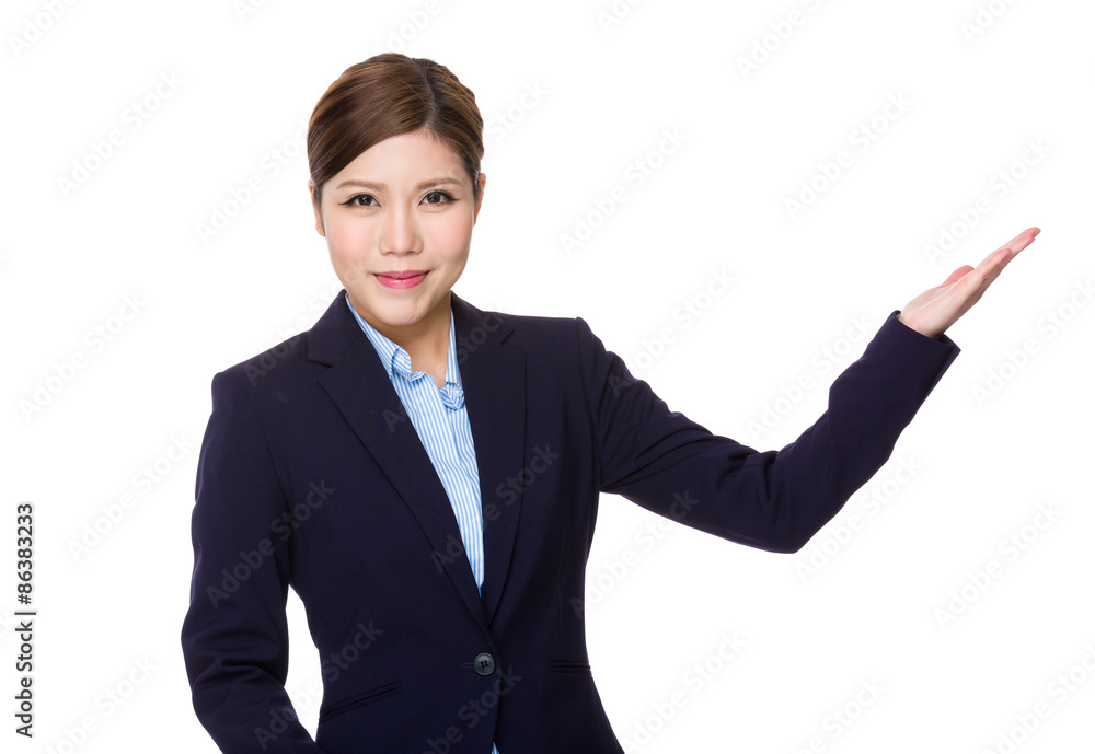 Asian businesswoman with hand showing a blank sign Asian businesswoman with hand showing a blank sign