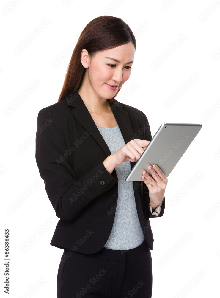 Businesswoman use of the digital tablet Businesswoman use of the digital tablet