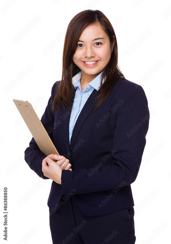 Asian businesswoman holding with clipboard Asian businesswoman holding with clipboard