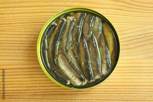 sprats on a wooden table