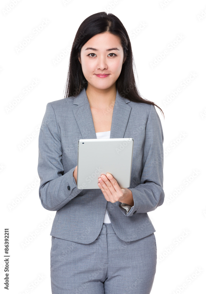 Asian businesswoman use of the digital tablet Asian businesswoman use of the digital tablet