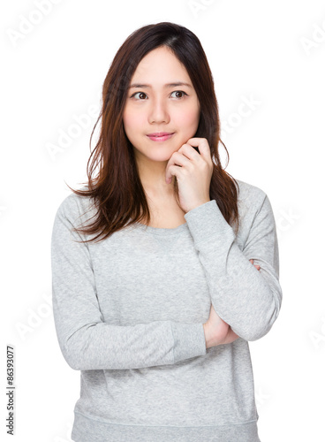 Asian young woman think of something