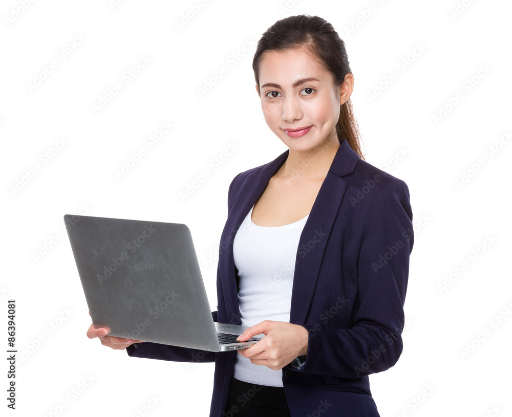 Asian businesswoman use of the laptop computer Asian businesswoman use of the laptop computer