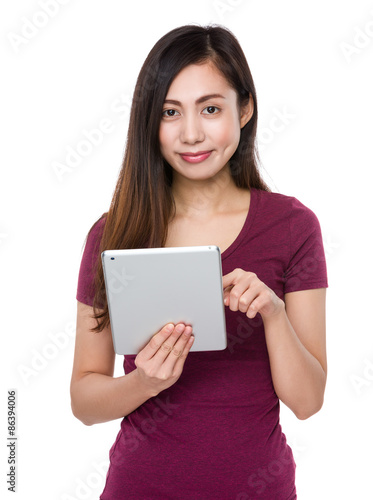 Asian Woman use of the digital tablet