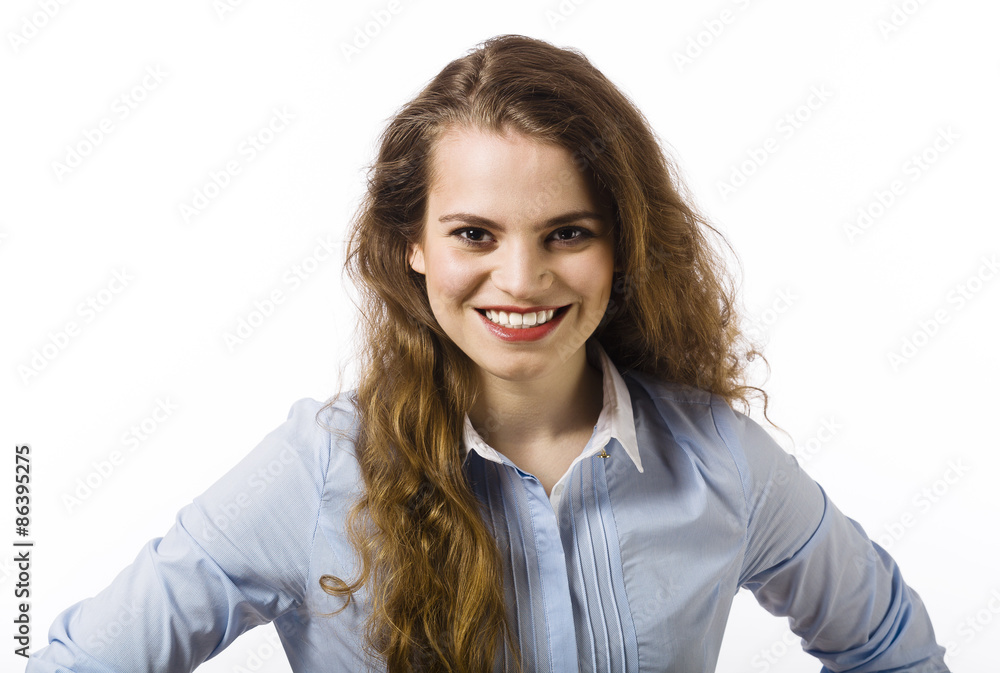Portrait of a beautiful smiling young woman dressed in a blue sh Portrait of a beautiful smiling young woman dressed in a blue sh