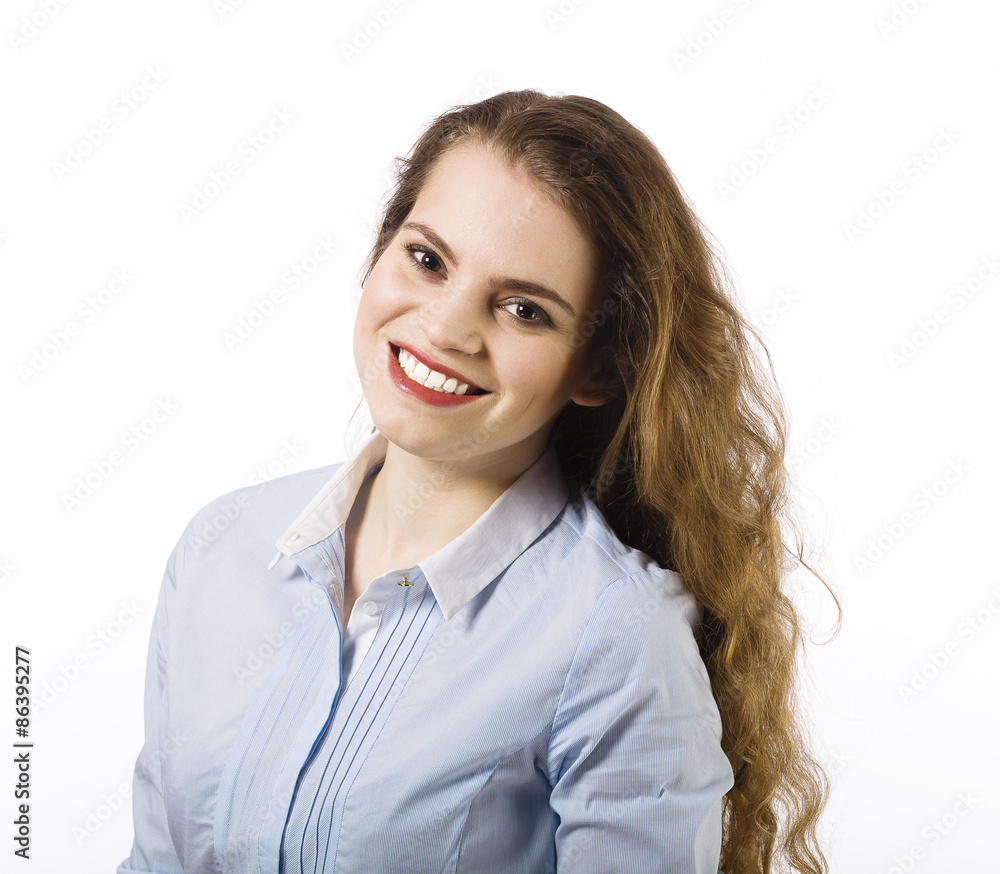 Portrait of a beautiful smiling young woman dressed in a blue sh Portrait of a beautiful smiling young woman dressed in a blue sh