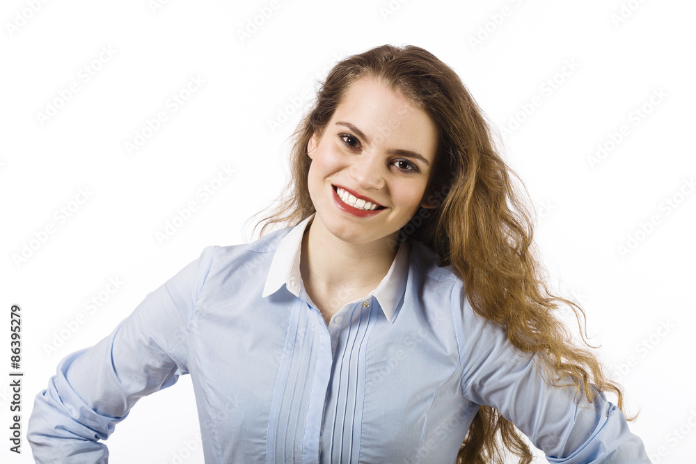 Portrait of a beautiful smiling young woman dressed in a blue sh Portrait of a beautiful smiling young woman dressed in a blue sh