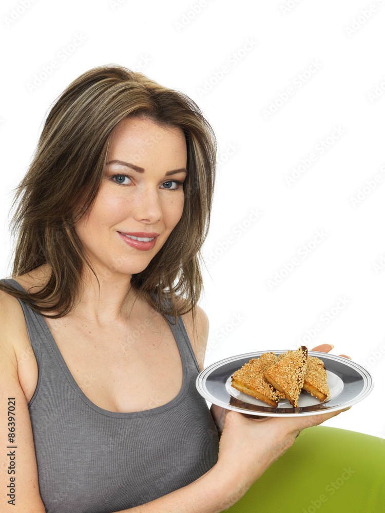 Attractive Young Woman Holding a Plate of Chinese Style Sesame Toast Attractive Young Woman Holding a Plate of Chinese Style Sesame Toast