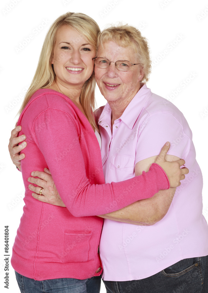 Portrait of a young blonde woman with her grandmother on a white background. Portrait of a young blonde woman with her grandmother on a white background.
